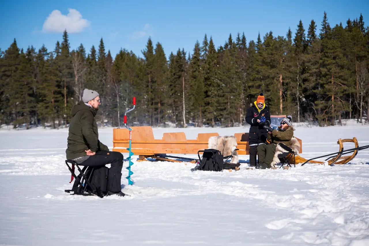 Snowmobile safari and ice fishing in Ranua